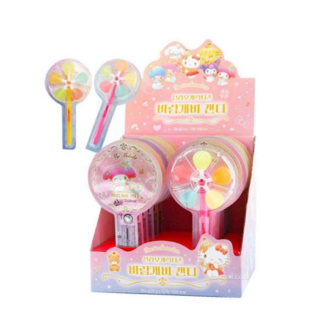 Colorful toy with a windmill design in a decorative box on a white background