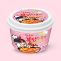 Samyang Buldak Carbonara Topokki Rice Cake Bowl 179g pink bowl on a pale pink background