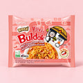 Samyang Buldak Rosé Ramen 140g pink packet on a pale pink background